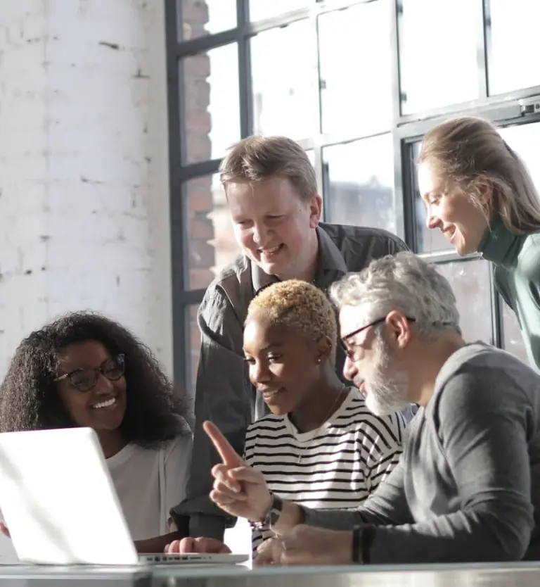 group-of-people-looking-at-laptop